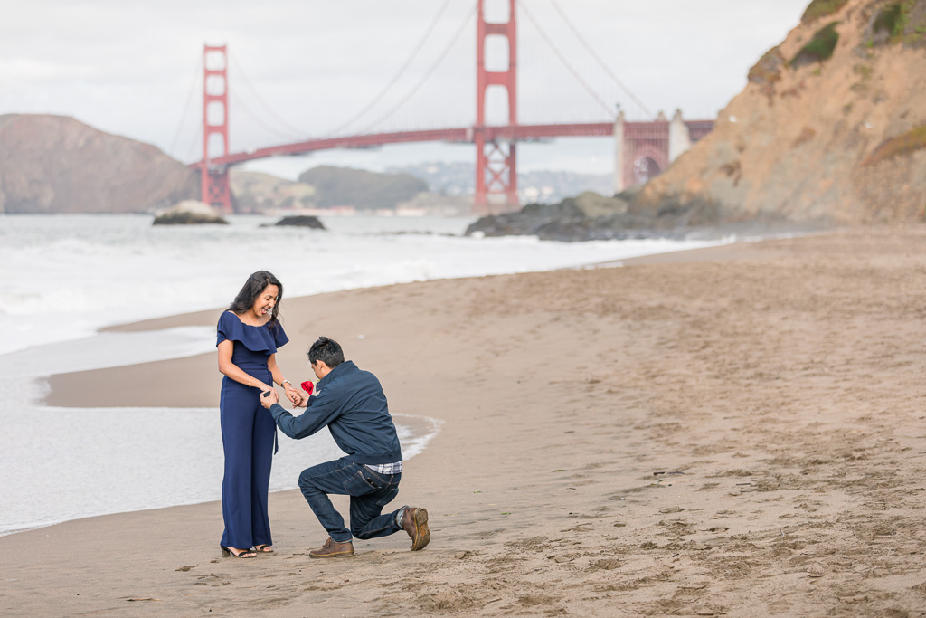 most precious reaction when he got down on one knee at this Baker Beach surprise proposal