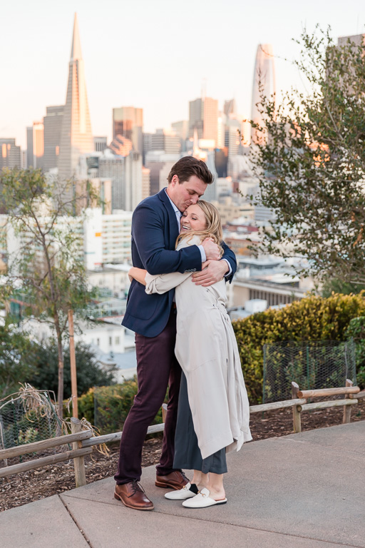 she said yes in front of the san francisco skyline