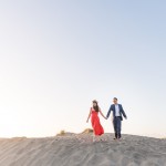 engagement photo shoot on sand dunes near golden hour