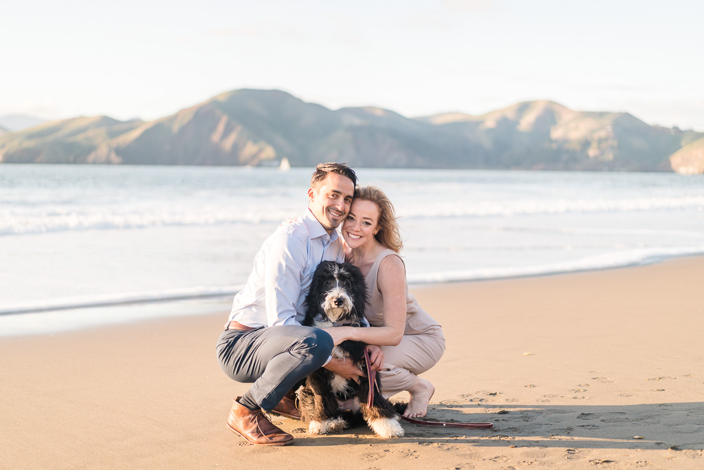 save-the-date picture at Baker Beach with a cute puppy