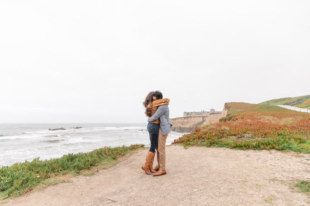 they got engaged in this open field overlooking the grand Ritz Carlton Hotel by the Pacific Ocean