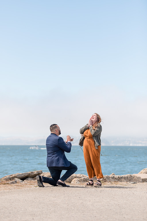 precious reaction during a San Francisco surprise proposal by the water