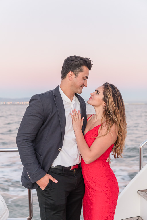 sunset engagement photo on a yacht