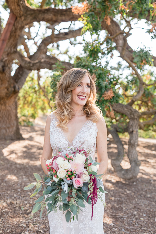 beautiful bride with wedding bouquet at Ruby Hill oak tree