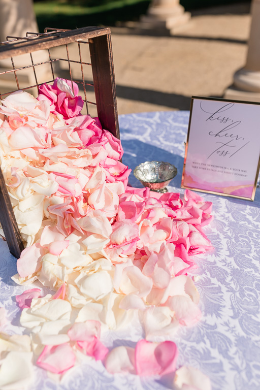 wedding ceremony table with flowers for petal toss