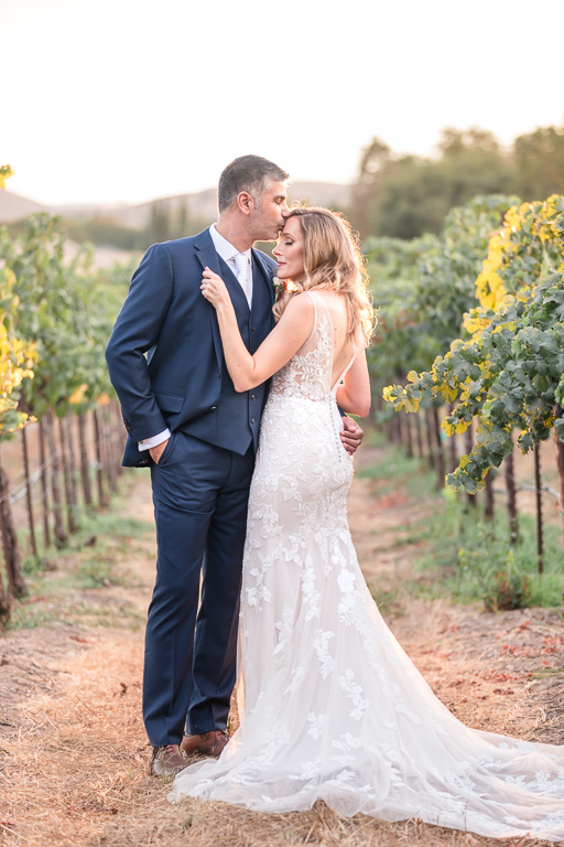 golden hour sunset wedding photo at Ruby Hill vineyards