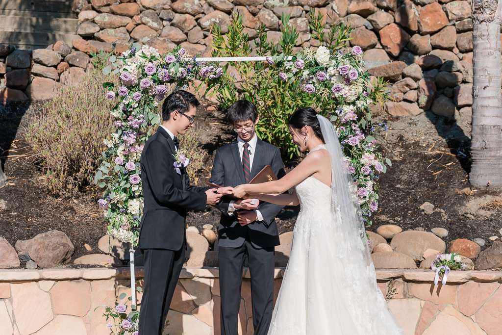 backyard wedding ceremony ring exchange