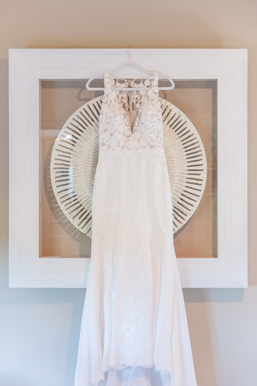 white wedding dress hanging