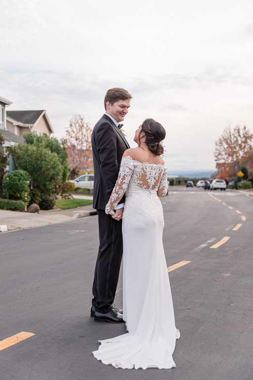 candid wedding photo on the streets in Foster City