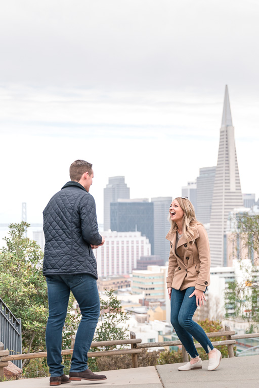 proposal on a hill with the TransAmerica Pyramid in the background