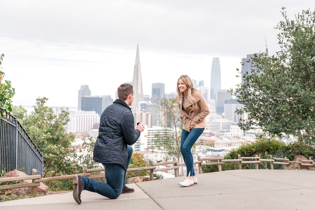 San Francisco surprise proposal in front of the Salesforce Tower and TransAmerica Pyramid
