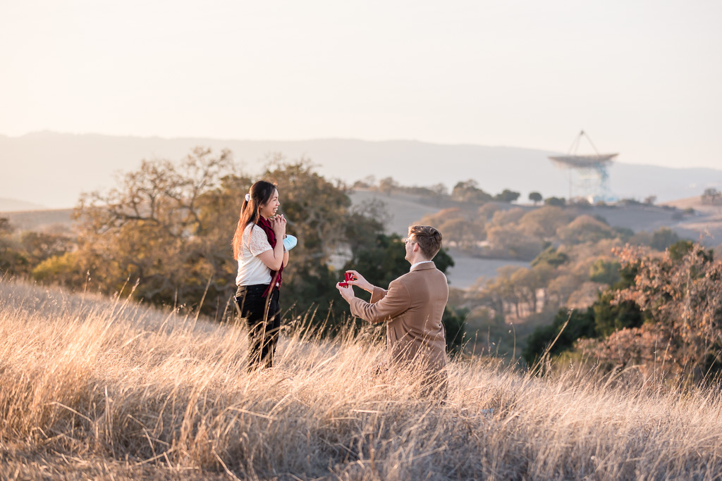 a romantic surprise proposal at Stanford Dish trail