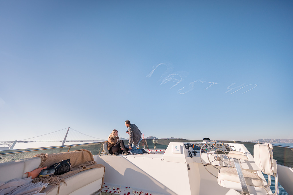 skywriting proposal with name spelled out in the air