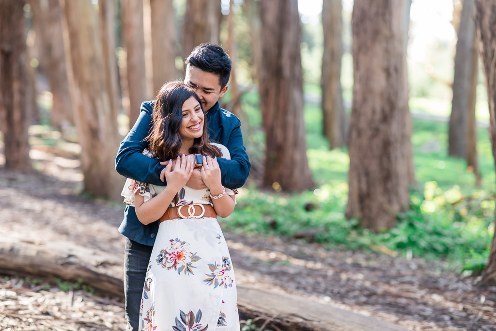 Lovers' Lane engagement portrait in the woods