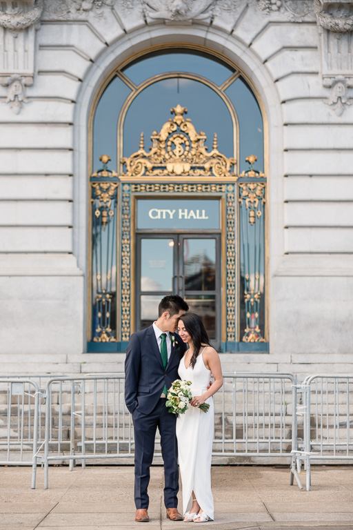 bridal portrait in front of San Francisco City Hall main entrance