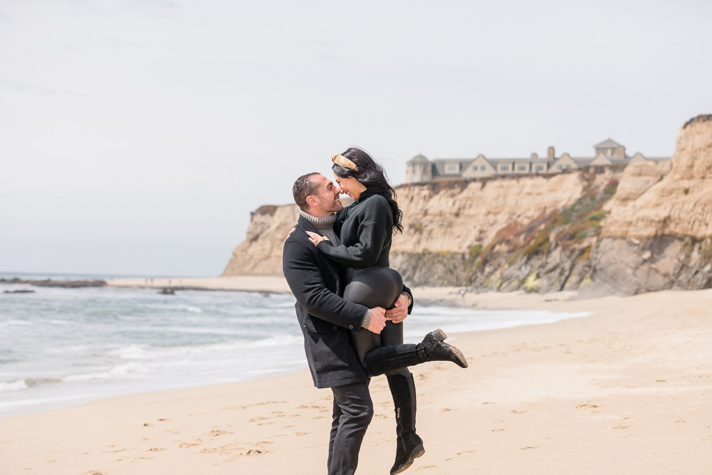 post proposal couple portrait on Ritz Carlton beach