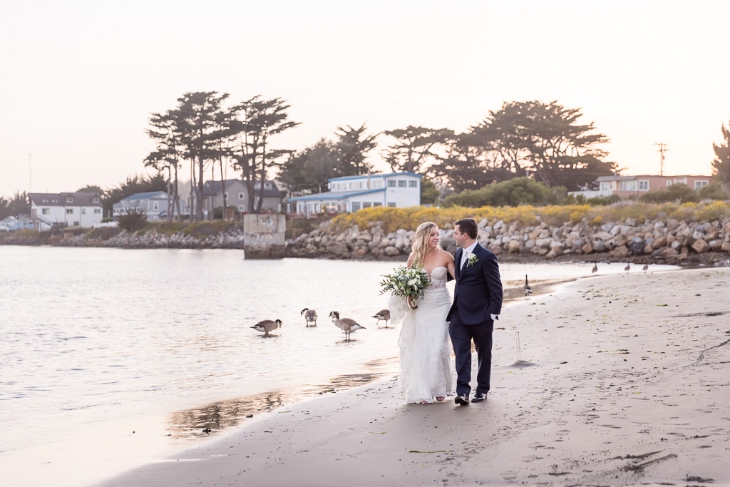 bride & groom wedding photos on the beach with geese in Half Moon Bay
