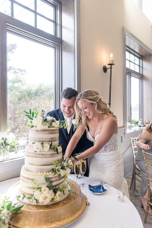 bride and groom cake cutting at Oceano Hotel