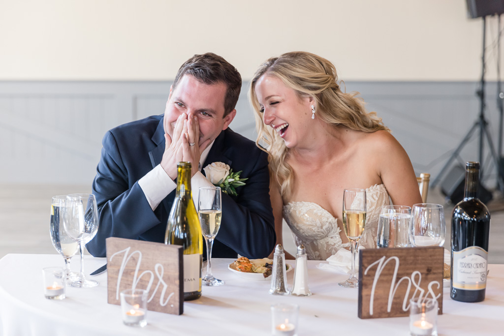 groom reacting to embarassing wedding toast story