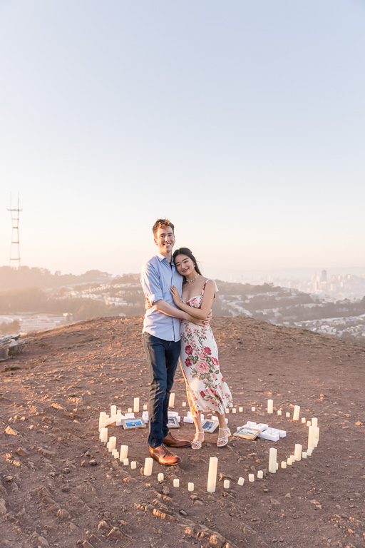 proposal setup with candles, light-up letters, and photos