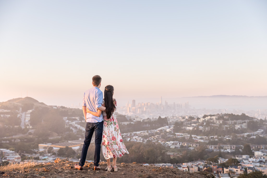 couple looking out over San Francisco during sunset
