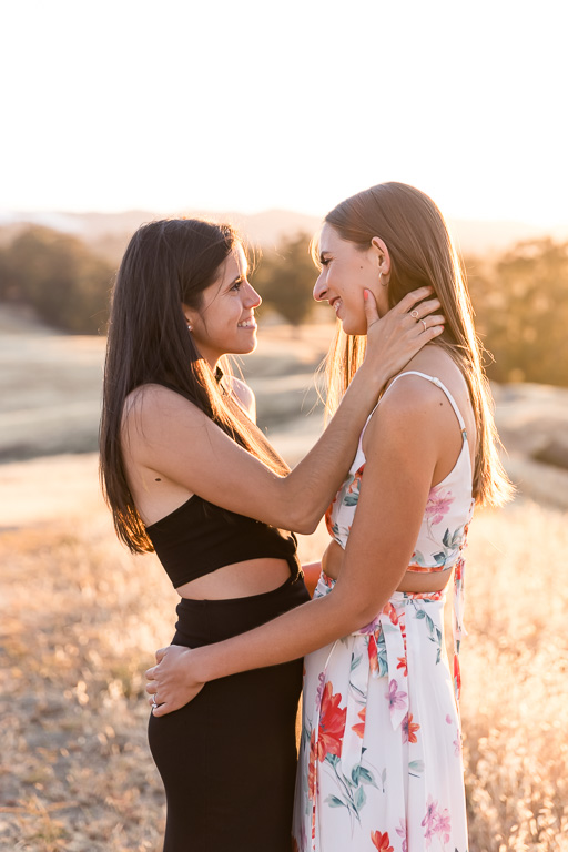same-sex couple engagement photo looking into eyes