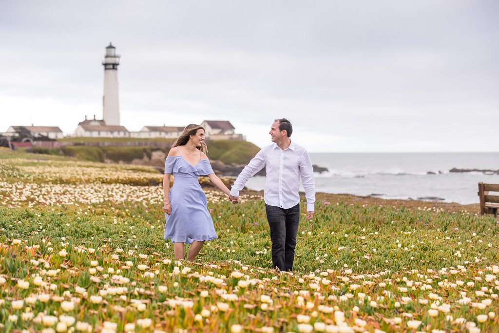 engagement photo at Pigeon Point Lighthouse wildflower field