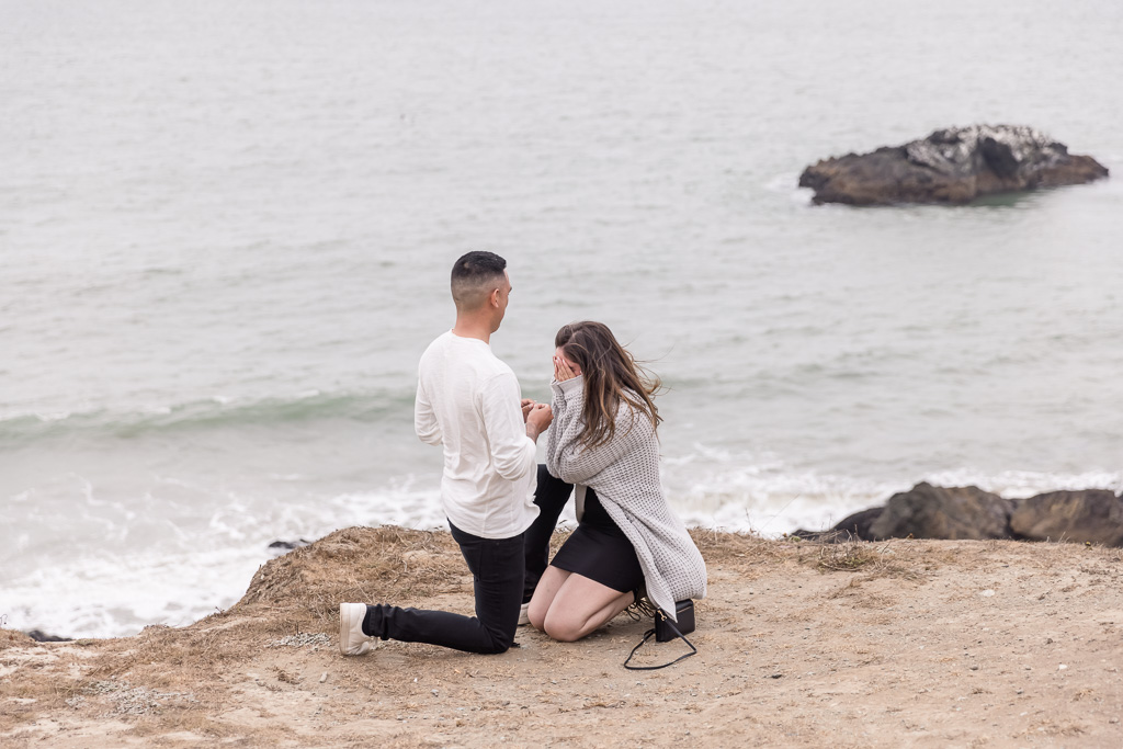 very cute surprise proposal by the ocean in San Francisco