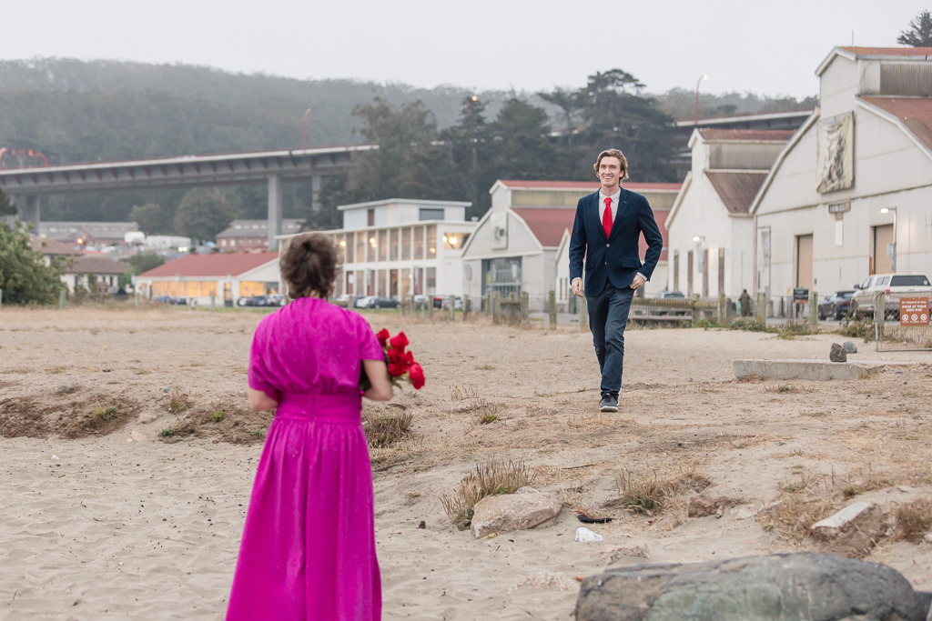 groom-to-be approaching his bride for surprise proposal