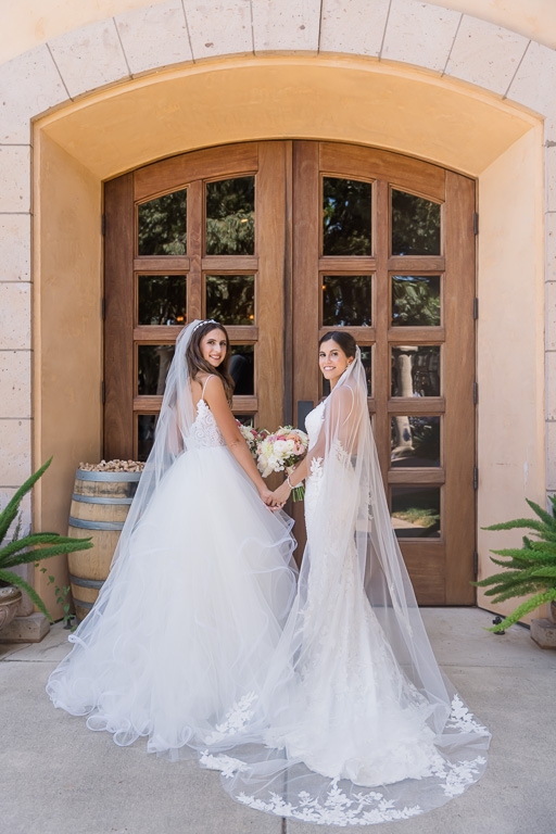 photo of the brides in front of Trentadue Winery door