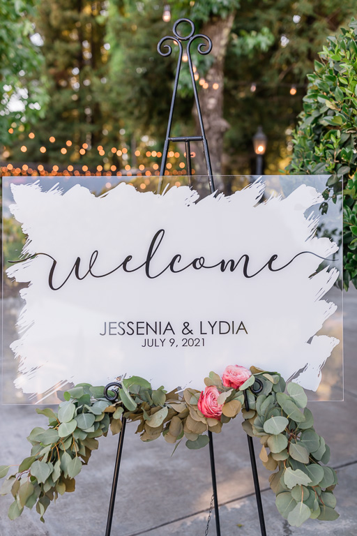acrylic wedding sign with florals