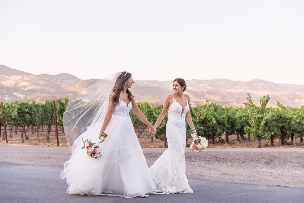 sunset wedding photo of two brides at Trentadue Winery