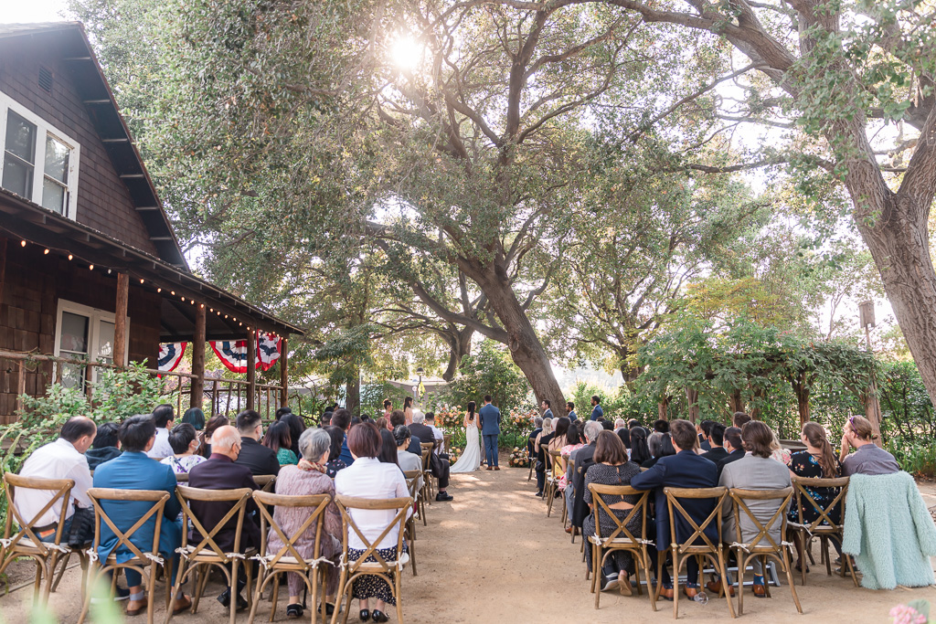 Los Altos History Museum wedding ceremony under the sunny trees