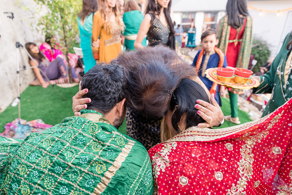 giving blessing during mehndi ceremony