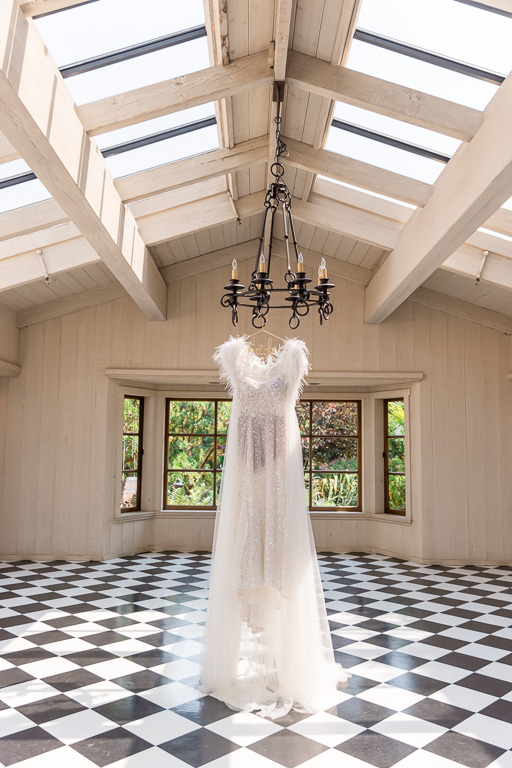 reception gown with a feather cape