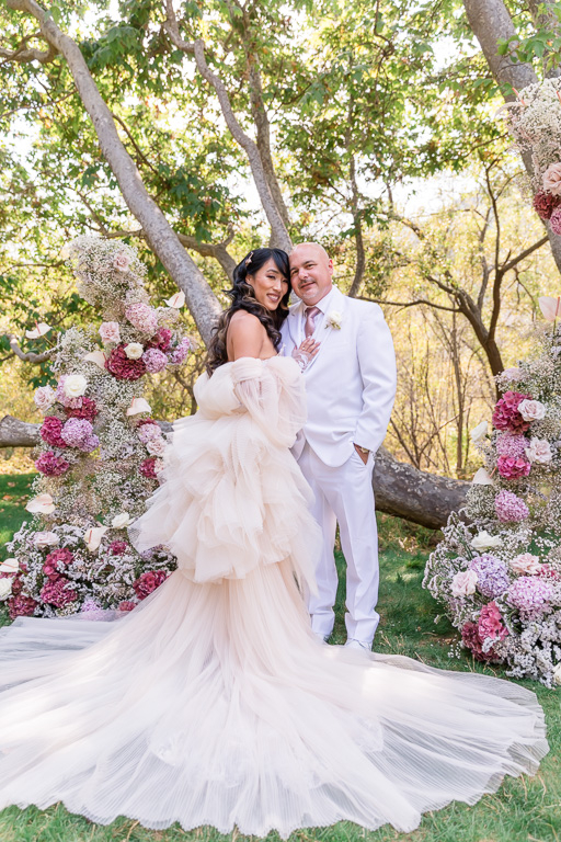 whimsical wedding with lush florals and soft tulle