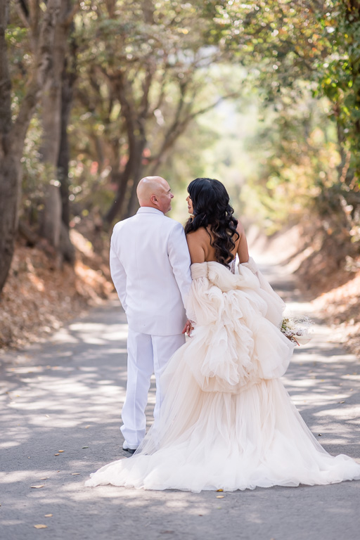 bride walking in her luxury Galia Lahav gown