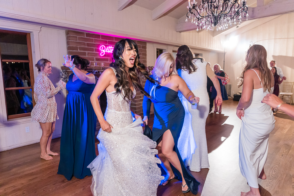 bride dancing with the girls