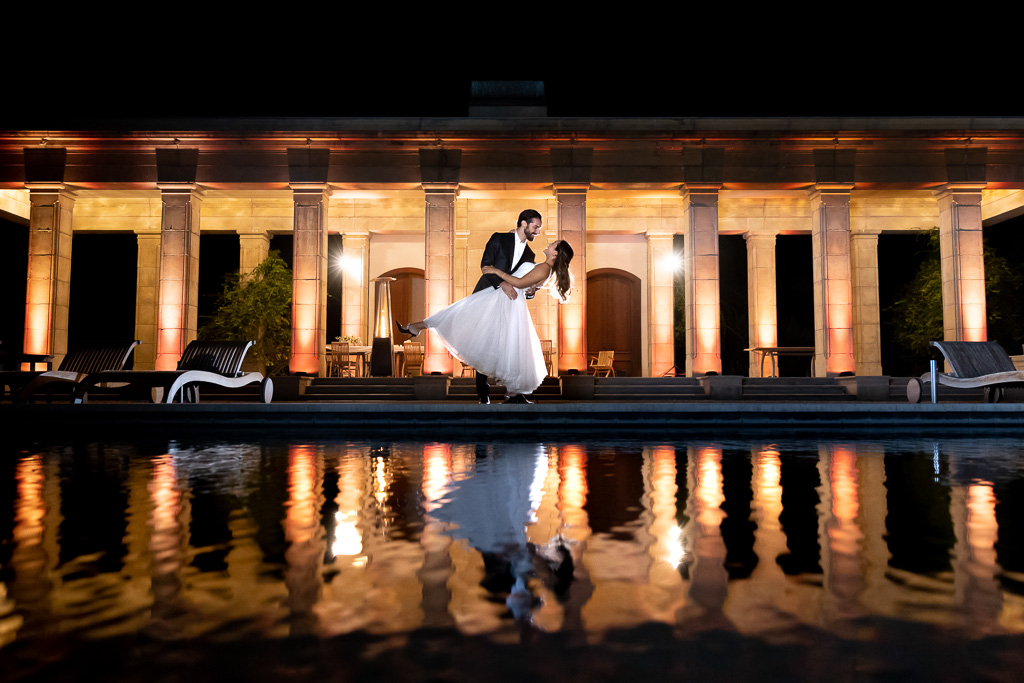 creative Chateau di Ninis infinity pool reflection night wedding photo