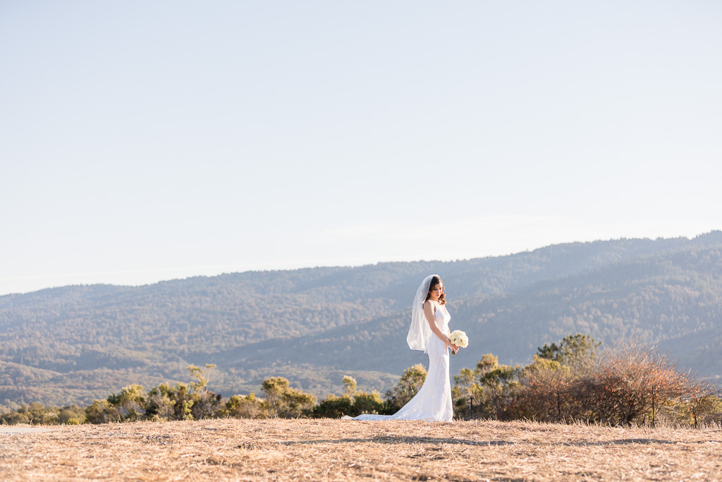 bride solo in front of mountains