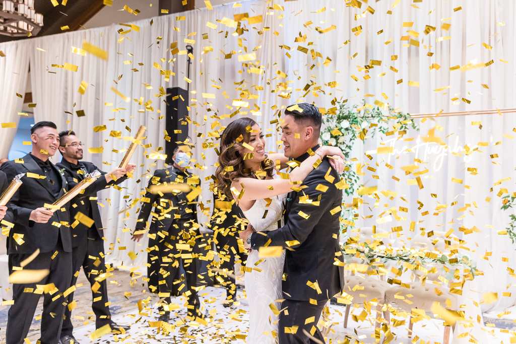 confetti cannons celebrating bride and groom fun reception