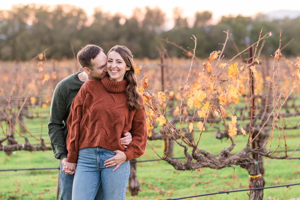 fall engagement photo in Napa with golden color theme