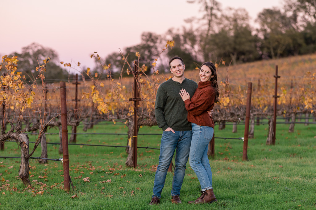 engagement photos in vineyard at dusk
