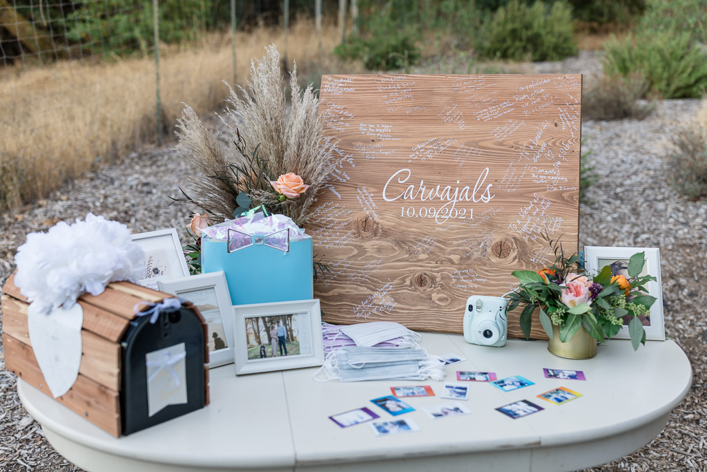 wedding reception sign-in table with wooden wedding sign