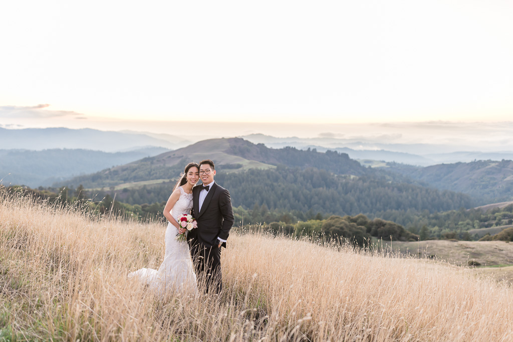 wedding photo in rolling hills of golden grass