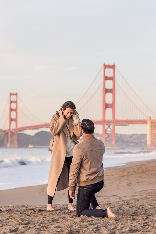 sunset surprise proposal at Golden Gate Bridge beach