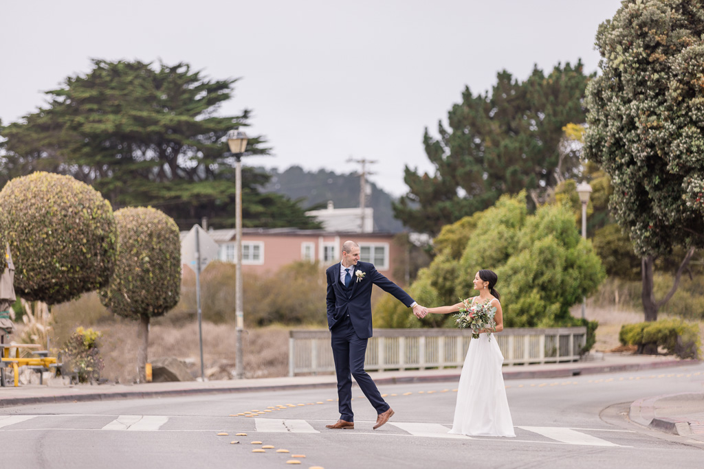 candid crosswalk wedding photo