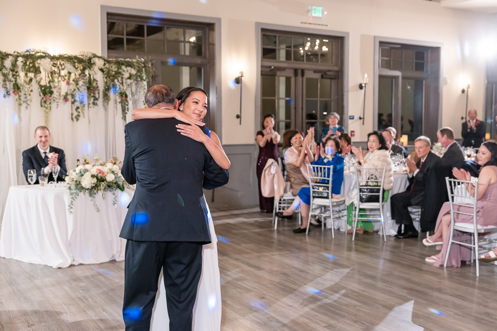 bride and dad hugging on dance floor