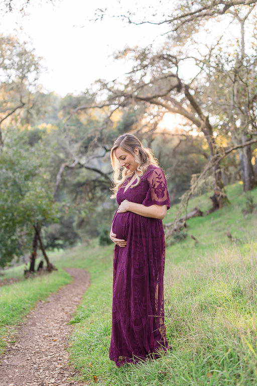 maternity photos in a golden forest