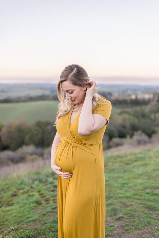 maternity photo in yellow dress